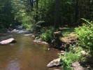 Peeking upstream from one of the boulders
