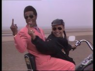 Cat and Lister flipping Rimmer off