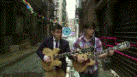 Cousins: Ezra and Rostam playing surfy guitar on the cart