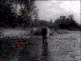 Skull: Lou fishes his amp out of the river