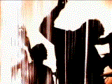 Stupid Girl: Silhouetted members of Garbage behind distorted filmstock