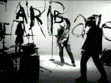 Stupid Girl: Garbage thrashing around their name and song lyrics scrawled on the walls